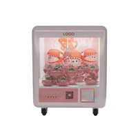 2025 Usine Directe Mini Poupée Machine À Monnaie Multi-Fonction Boîte Magique Griffe Clip Jouet et Bonbons Cadeau Griffe Machine
