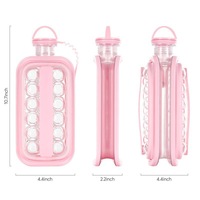 Bouteille d'eau portable pliable 2-en-1 en plastique sans BPA avec moule à glaçons en grille et couvercle pour la maison