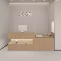 Comptoir de réception en verre pour magasin de vêtements moderne et minimaliste, comptoir de caisse décoratif, vitrine de présentation