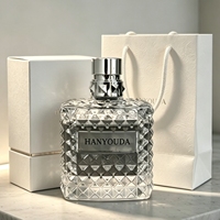 Flacon de parfum de luxe 100 ml en verre triangulaire clouté avec bouchon argenté, design carré en cristal gravé, flacon pulvérisateur de parfum gravé à l'acide