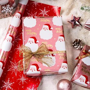 Papier cadeau de Noël rose, enduit d'aluminium, tête du Père Noël, imprimé recto-verso avec motifs flocons de neige, personnalisable - Product Image 1