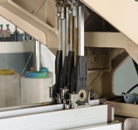 Machine à tisser à jet d'eau pour tissu satiné à haute efficacité et haute densité (motifs unis, sergé ou complexes)