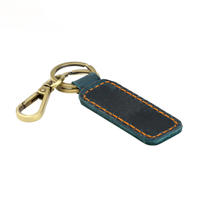 Porte-clés en cuir souple avec boussole vintage faite à la main en alliage de zinc durable et mousqueton pivotant, idéal pour un cadeau d'affaires