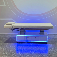 Lit de beauté électrique moderne en acier inoxydable fabriqué en usine avec un design unique pour salon, spa, table de massage