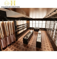 Présentoirs à parfums de haute qualité, présentoir mural moderne noir personnalisé pour boutique de parfums, vitrine d'exposition