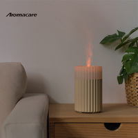 Aromacare 100Ml Vente en gros Humidificateur ultrasonique à flamme Diffuseur d'arôme de bougie de feu d'huile essentielle