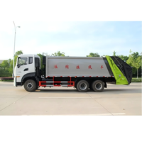 Vente directe usine : Camion compacteur de déchets 6x4 22m³ avec mécanisme de levage de benne à bras oscillant (partie supérieure)