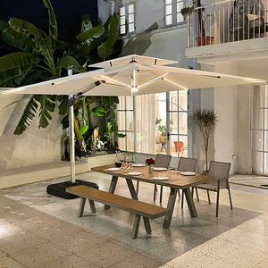 Ensemble de salle à manger d'extérieur moderne et durable avec coussins imperméables, table en bois et chaises en rotin - Product Image 2