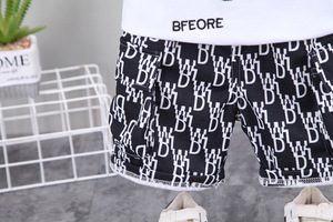 Vêtements de boutique pour enfants d'été, vêtements noirs et blancs pour garçons, ensembles de vêtements de nuit avec motif de dessin animé - Product Image 5