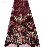 Tissu en dentelle brodée de sequins bordeaux