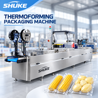 Machine de thermoformage pour l'emballage alimentaire de filets de poisson, de crevettes et de fruits de mer