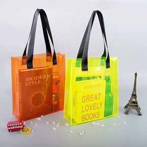 Bolsa de regalo transparente colorida personalizada, bolsa de compras transparente, bolsa de mano impermeable de Pvc con logotipo impreso - Product Image 1