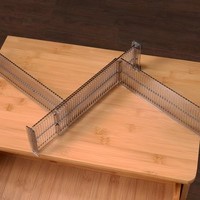 Séparateur de tiroir de 29 à 53x8cm pouvant être librement combiné horizontalement et verticalement pour organiser les sous-vêtements et les chaussettes.