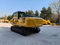 Excavatrice sur chenilles 320GX, fabrication locale reconnue pour les travaux de terrassement et les carrières de taille moyenne