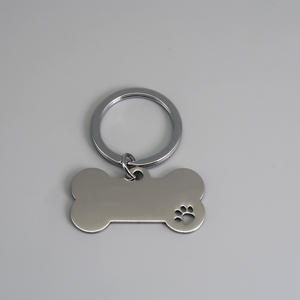 Porte-clés en acier inoxydable en forme d'os pour chien, personnalisé en gros, 40*20mm, porte-clés en métal anti-perte avec patte - Product Image 1