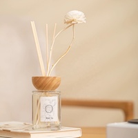 100ml 150ml Vente en gros de marque privée Diffuseur de roseaux de couleur givrée Couvercle en bambou Aroma Bouteille de diffuseur de roseaux de luxe