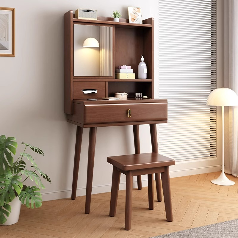 Walnut-colored sliding vanity table with included stool