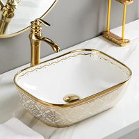 Lavabo de salle de bain rectangulaire en céramique dorée de luxe avec égouttoir pour montage sur robinet monotrou pour la maison ou l'hôtel