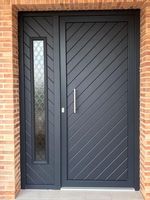 Modèles de portes métalliques à double porte en fer forgé pour l'entrée principale de la maison avant noire