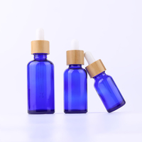 Flacon compte-gouttes en verre pour huiles essentielles naturelles, couvercle en bambou de luxe, 15ml 30ml 50ml, vert givré, bleu, ambre, transparent