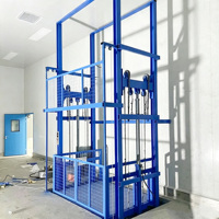 Plateforme élévatrice verticale hydraulique sur rail de guidage, élévateur de marchandises stationnaire, monte-charge électrique pour le stockage et le regroupement de marchandises en entrepôt