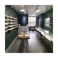 Vitrine optique en bois exclusive Boutique Design Disposition Support mural pour lunettes Vitrine pour lunettes Présentoir pour lunettes
