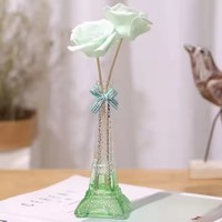 Flacon diffuseur en verre de 30ml en forme de tour Eiffel de couleur personnalisée spéciale avec roseau pour cadeau de Saint-Valentin