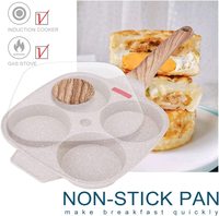 Poêle à frire antiadhésive en pierre médicale au design moderne 4 tasses, avec couvercle, spatule à brosse et quatre trous pour les œufs.