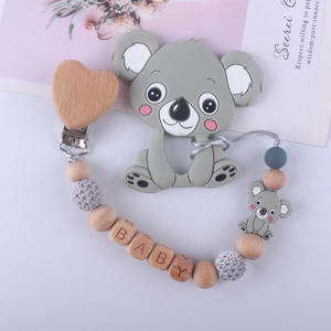 Nouvelle chaîne de sucette pour bébé faite à la main motif de dessin animé perles de silicone sans BPA perles en bois Style de mode anneau de dentition 0-12 mois bébé - Product Image 4