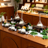 Testeur d'huiles essentielles parfumées, flacon en verre avec base en acrylique noir estampé à chaud, pour l'arôme des fleurs, avec entonnoir de présentation