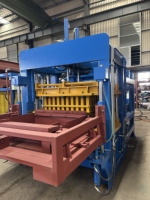Machine à blocs entièrement automatique QT10-15 avec système de mélange frontal pour produits en béton coloré