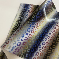 Tissu d'ameublement en vinyle PU holographique laminé, imprimé léopard arc-en-ciel irisé 3D, motif animal, résistant à l'eau
