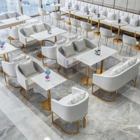 Neues Design Modernes Rundes Café-Sitzgruppen-Set mit Tisch und Stühlen in Weiß und Schwarz für Zuhause & Restaurant