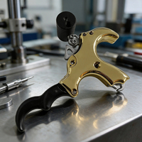 Distributeur de plaques de déclenchement en laiton massif avec poignée interchangeable 3 ou 4 doigts – Équipement robuste et pratique pour le tir à l'arc quotidien