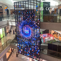 Affichage LED transparent en maille UHLED P3.91-7.82, 80% de transparence, 4500 nits, 3840 Hz, IP65, intérieur/extérieur, façade de bâtiment, publicité