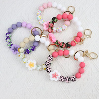 Porte-clés et porte-monnaie à perles en silicone style floral pour femme
