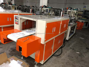 Macchina monouso per guanti a due strati con strappo automatico - Product Image 3