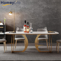Ensemble de table à manger en céramique européenne moderne avec plateau en pierre frittée et 6 chaises, structure en acier inoxydable pour appartement ou hôtel
