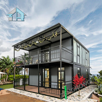 Maison en conteneur à toit plat à deux niveaux de 20 pieds Villa préfabriquée en duplex de 2 à 3 chambres à coucher Terrasse sur le toit pour immeuble de bureaux Appartement Hôtel