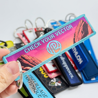 Porte-clés en tissu tissé personnalisé avec logo, bord surjeté, vente en gros, pour promotion et cadeaux