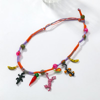 Collier en corde tressée à la main style européen et américain pour femme, avec pendentifs léopard, crocodile, canard et perles en plastique, délicat