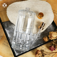Flacon de parfum transparent de 100 ml de style colonne romaine, avec boîte cadeau cylindrique personnalisée et impression du logo de la marque, fabriqué sur mesure
