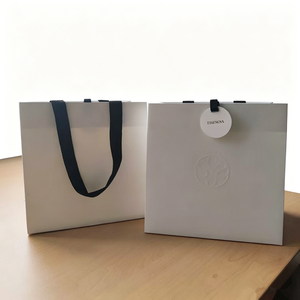 Essenova Luxury White Paper <b>Bag</b> With Embossed Logo Ribbon Handle Recyclable Cosmetic Packaging - Product Image 5