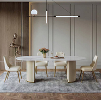 Ensemble de table à manger ovale moderne beige italien pour six personnes, bordure dorée, acier inoxydable, plateau en marbre, best-seller pour appartements et restaurants