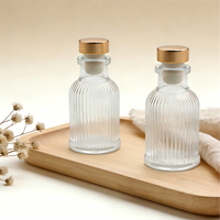 Bouteille diffuseur d'arômes en verre transparent rond vide de 50 ml avec logo personnalisé pour salle de bain
