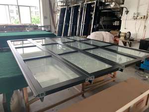 <span class=keywords><strong>Porte</strong></span> de <span class=keywords><strong>garage</strong></span> <span class=keywords><strong>motorisée</strong></span> à panneau en verre trempé avec cadre en aluminium à bas <span class=keywords><strong>prix</strong></span> - Product Image 2