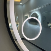 Miroir LED contemporain personnalisé pour l'hôtellerie, avec cadre noir, grossissement 5x, capteur tactile intelligent, IP66, vente en gros usine