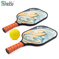 Raquette de pickleball en fibre de verre Shinho en promotion pour l'entraînement physique et le jeu, idéale comme cadeau promotionnel avec design personnalisé