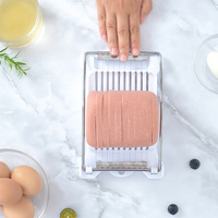 Outil de cuisine manuel durable en acier inoxydable à grande base anti-dérapante pour les œufs durs à usages multiples