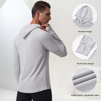 Sweat-shirt de sport à capuche pour homme, manches longues, avec trous pour les pouces, coupe ample, décontracté, pour la course à pied et le fitness, en polyester 100% uni, idéal pour l'automne